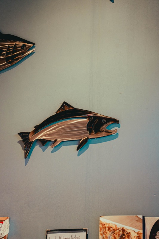 Salmon wood carving on the wall